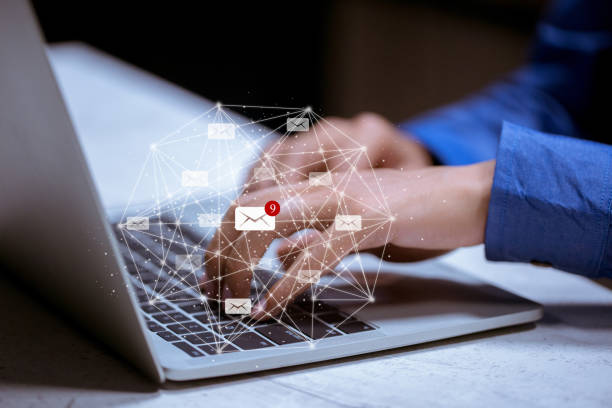 istock Business using laptop,with email icon,email inbox electronic communication graphics concept. 1198455271