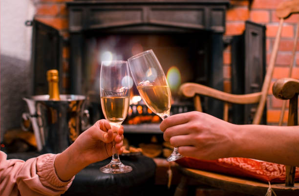 istock Couple cheering with champagne 1198457460