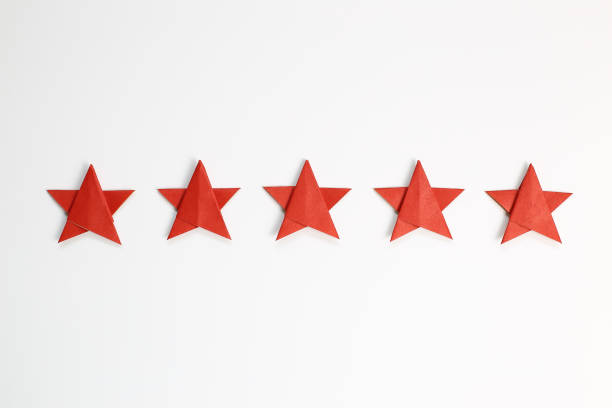 istock Five stars quality rating on white background 1198458663