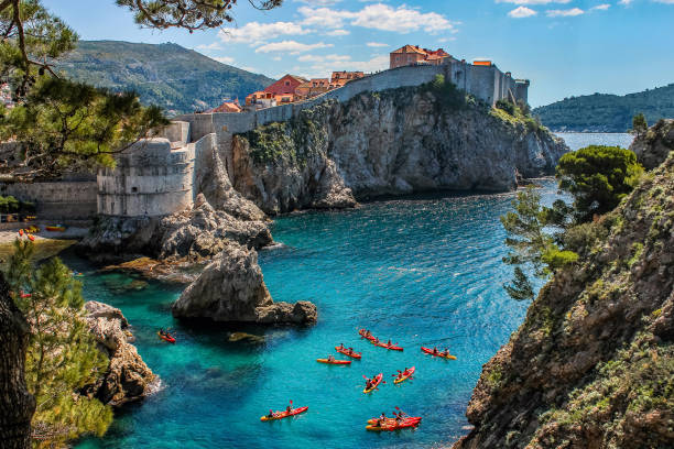 dubrovnik city - kayaking kayak sea coastline stock-fotos und bilder