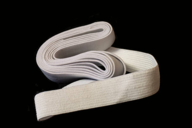 бланширование резиновой ленты ткани для рукоделия ткани - лента для шитья стоковые фото и изображения