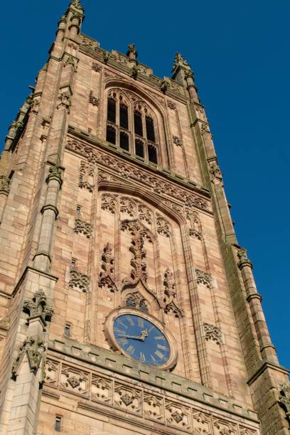 Derby Cathedral in England Derby Cathedral against a clear blue sky derby city stock pictures, royalty-free photos & images