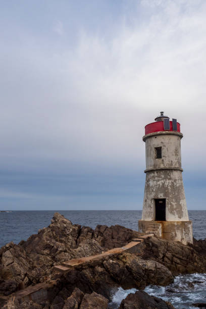 istock Cape Ferro lighthouse in Sardinia 1198472214