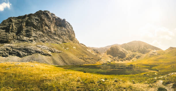 istock Amazing mountain lake landscape between Bolkar Mountain and Taurus Mountain. Panoramic view of black lake at sunset. Nigde, Turkey. Volcanic crater. Travel background. 1198475789