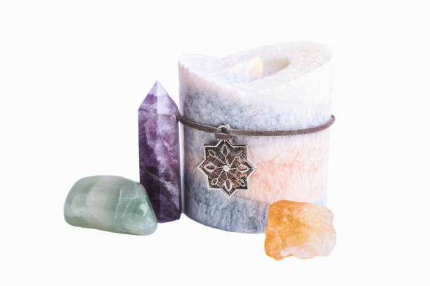 Candles lit during Buddhist activities are arranged into Buddhist symbols