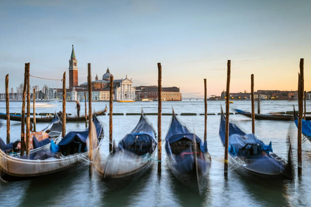 istock Venice, Italy - gondolas moored on the San Marco basin 1198476990