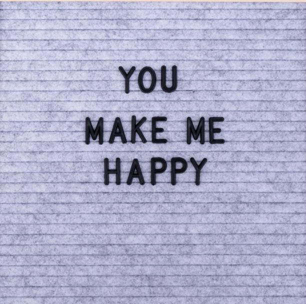 istock The words You Make Me Happy on grey felt letter board 1198484384