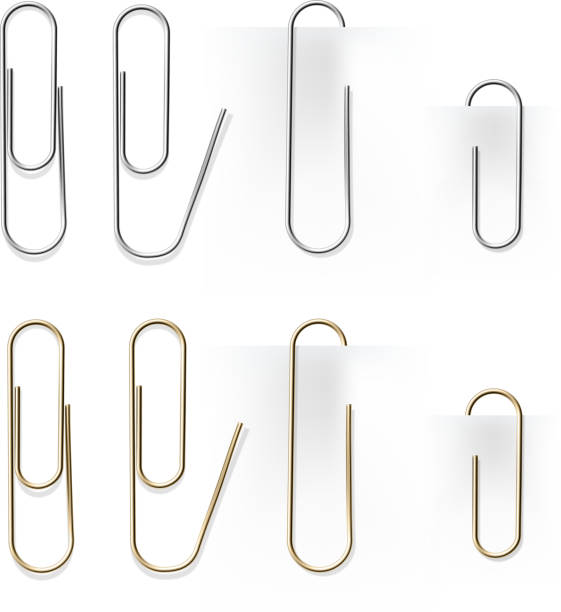 istock Realistic metal paper clips  set. Vector set.  Stationery paperclip accessory for holding several sheets of paper togethe 1198486351