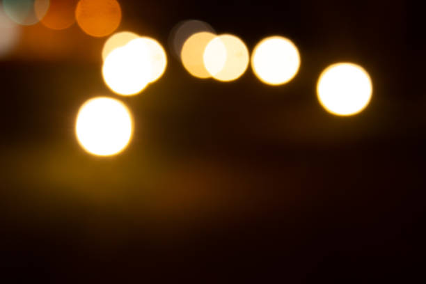 Bokeh effect of outdoor lights blurred in night time.
