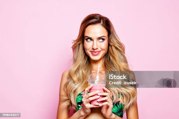 Summer Portrait Of Young Blonde Woman Holding Smoothie Stock Photo - Download Image Now