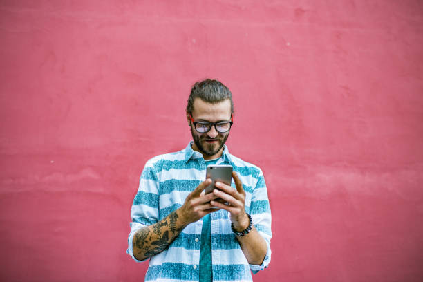 istock Portrait of a guy using phone 1198497186