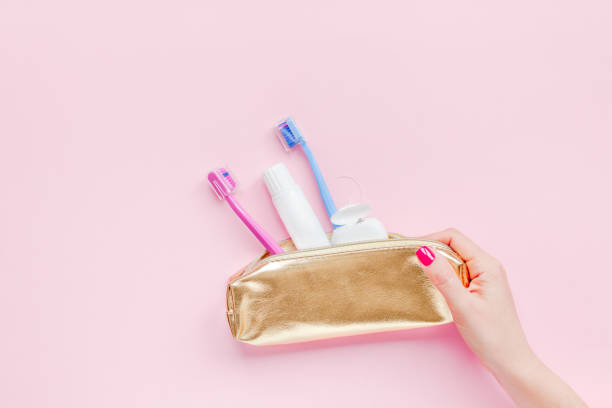 Teeth hygiene and oral care products flatlay stock photo