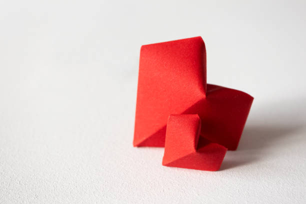 istock Two red origami hearts on white background in front view with copy space. Big and small heart shapes. Template Valentine's day or wedding invite, poster, postcard. Concept beautiful love 1198497946