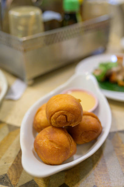 istock Chinese Fried steamed bun on white plate 1198498212