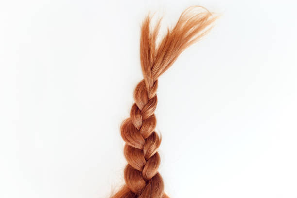 A little girl's hair, french braided.
