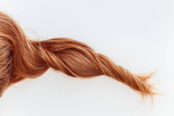 istock Red Hair over white background 1198498305