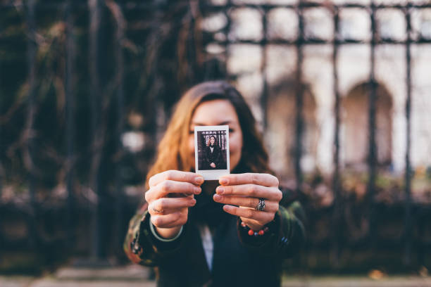 istock Woman showing instant selfie 1198499316