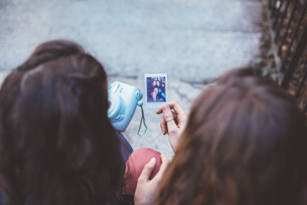 istock Women showing instant selfie 1198499465