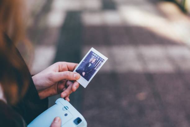 istock Woman showing instant selfie 1198499507