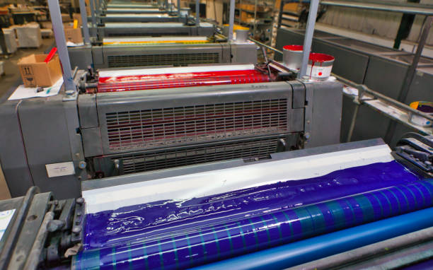 cilindros da máquina de impressão e pote de tinta de impressão - spotted cmyk ink printer - fotografias e filmes do acervo