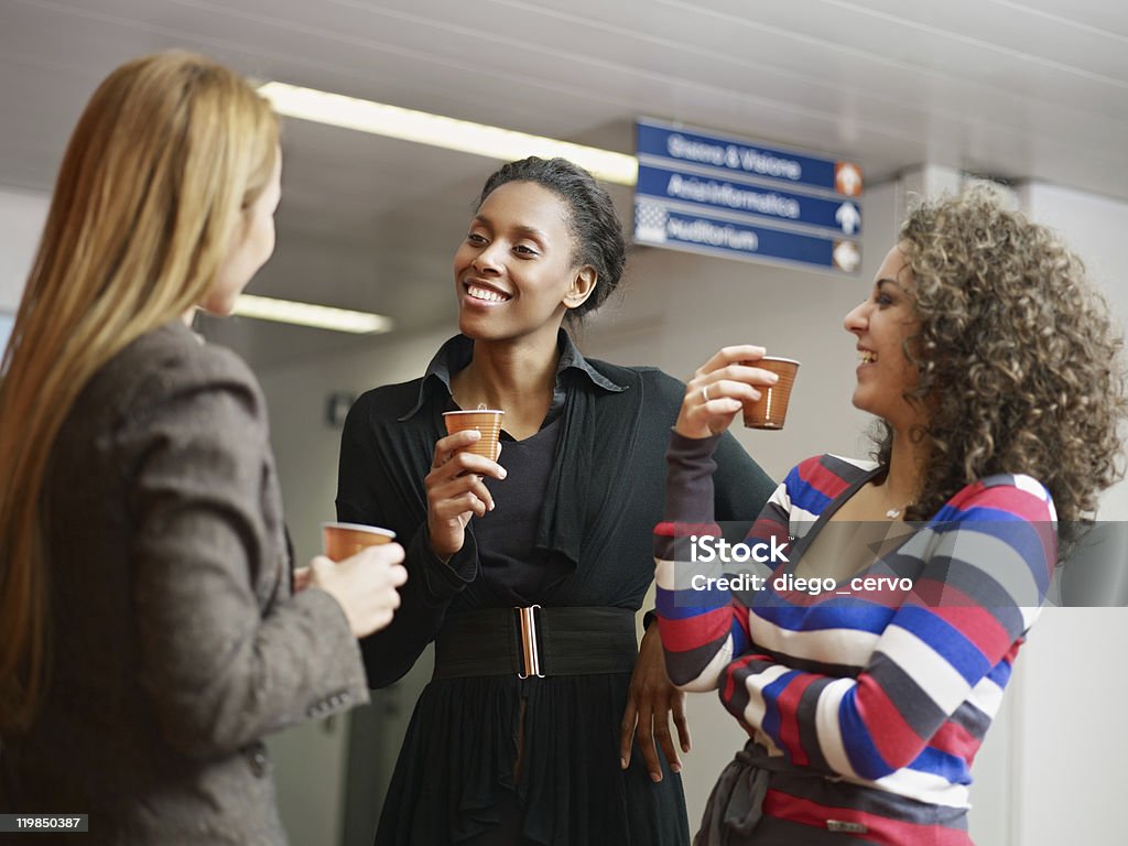 women having coffee break  Vending Machine Stock Photo