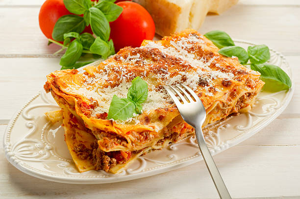 istock Minced meat and ragout lasagna topped with Parmesan cheese 119850416