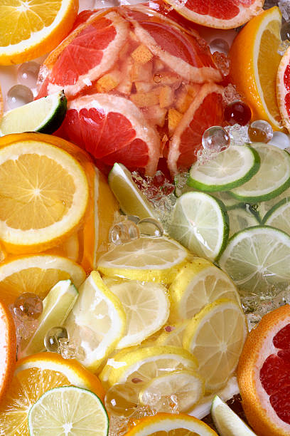 свежие цитрусовый плод jelly микс - crushed ice colors grape fruit стоковые фото и изображения