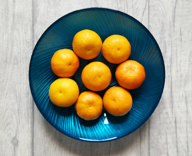 istock Tangerines on the plate 1198506138