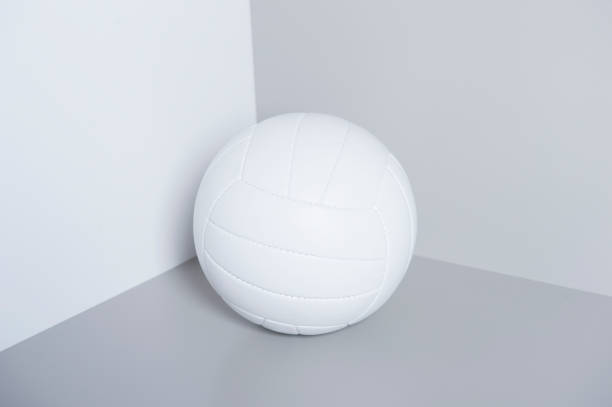 istock White volleyball ball isolated on white and grey background. 1198507142