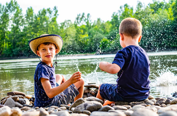istock Boys near the river 1198507839