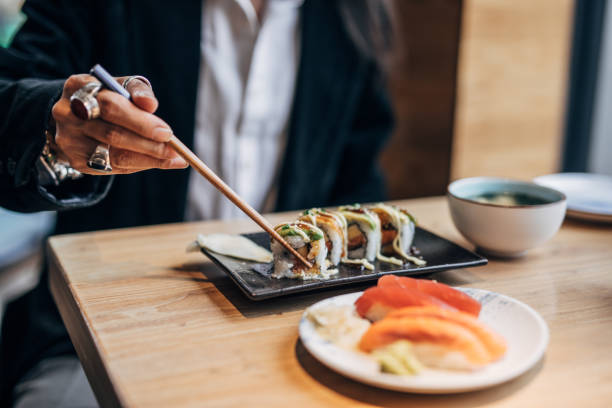 istock Mature man  in sushi bar 1198508005