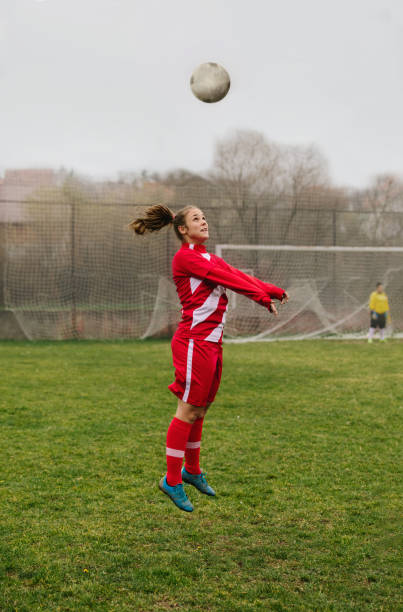 istock Female Soccer Player In Action 1198509350