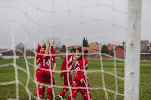 istock Female Soccer Team On Training 1198509946