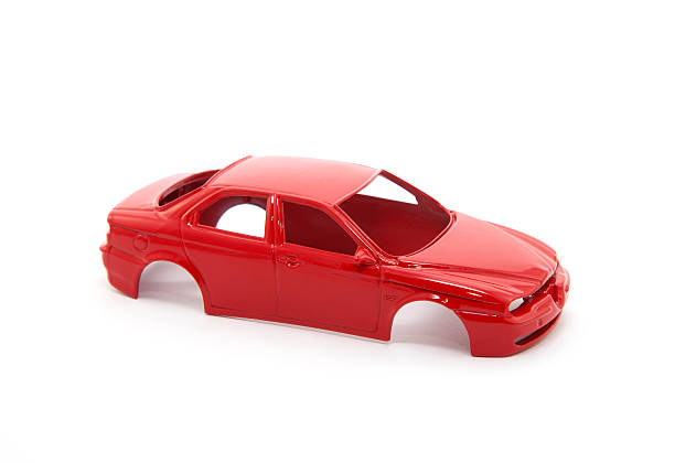 istock Red toy car body on white background 119851345