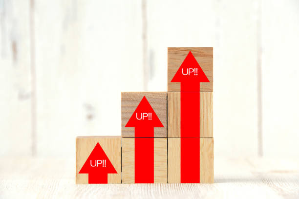 istock Rising arrows painted on wooden blocks 1198526376