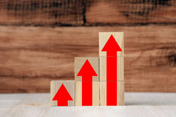 istock Rising arrows painted on wooden blocks 1198526395