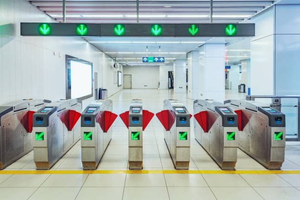 istock Turnstiles with electronic card readers on the subway station platform. 1198528938