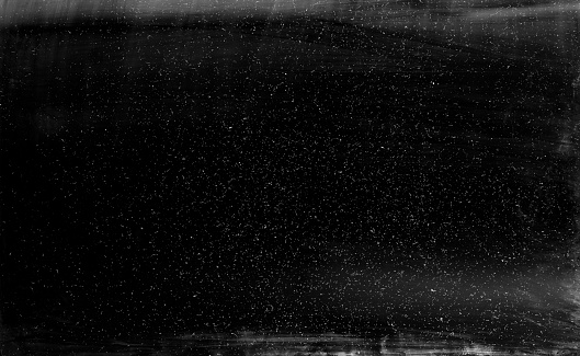 Black dusty texture overlay. Grainy film. Vintage abstract background.