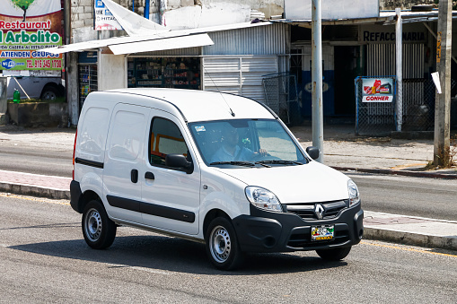 Palenque, Mexico - May 23, 2017: White panel van Renault Kangoo in the city street.