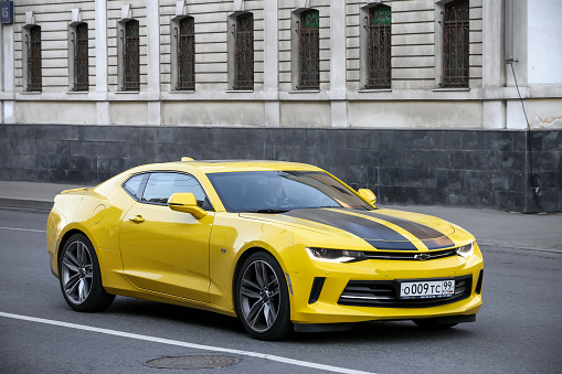 Moscow, Russia - April 19, 2019: American muscle car Chevrolet Camaro in the city street.