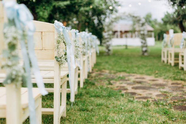 istock event wedding ceremony decor white chair flowers 1198531835