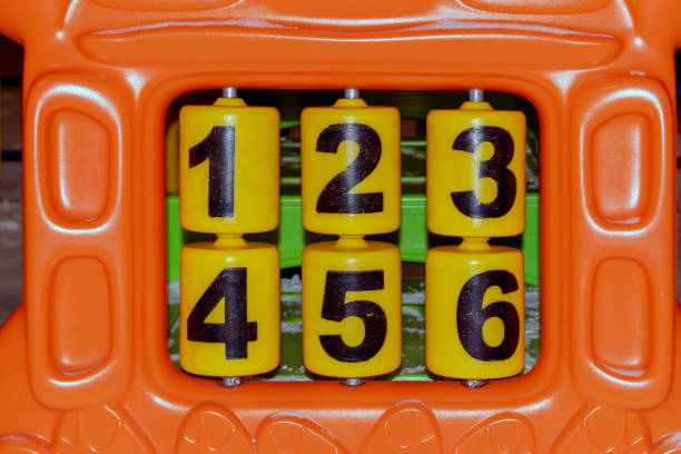 istock A fragment of a children's panel game complex with numbers. 1198532475