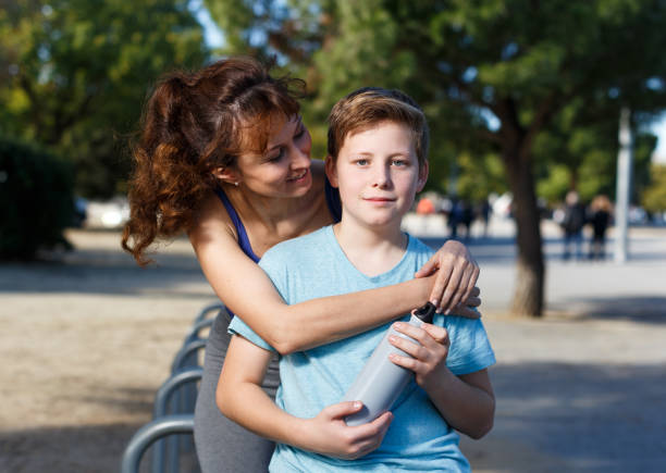 istock Family during break in outdoors workout 1198533741
