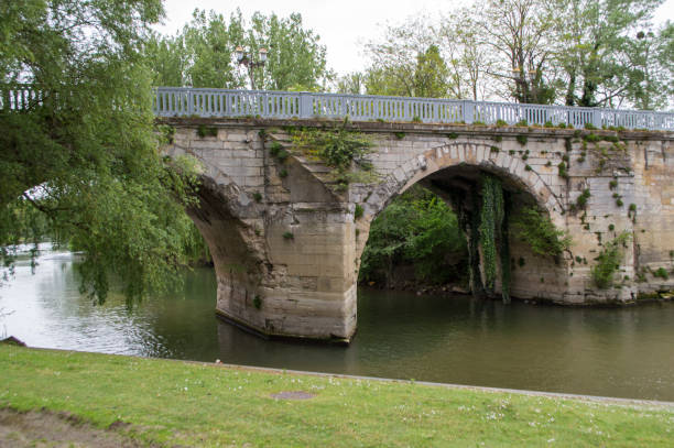 istock Old Bridge of Poissy and the Seine River 1198536747