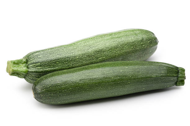 istock Zucchini (cucumber) isolated on white with clipping path. 1198541050