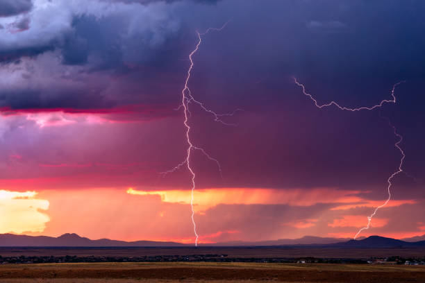 istock Thunderstorm lightning bolts and storm clouds 1198542965