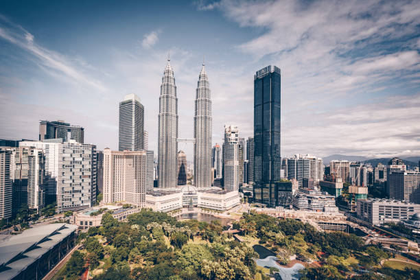 istock Kuala Lumpur Skyline with Petronas Towers a sunny day 1198545599