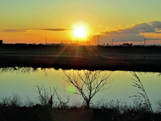 istock January. Edogawa river near Tokyo. Sunset. 1198549268