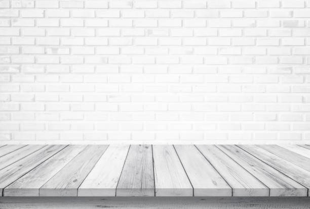 Empty wooden table top isolated on white brick white background, Design Wood terrace white. Free space for your copy and branding. Can be used as product display montage. Vintage style concept. Empty wooden table top isolated on white brick white background, Design Wood terrace white. Free space for your copy and branding. Can be used as product display montage. Vintage style concept. parquet floor perspective stock pictures, royalty-free photos & images