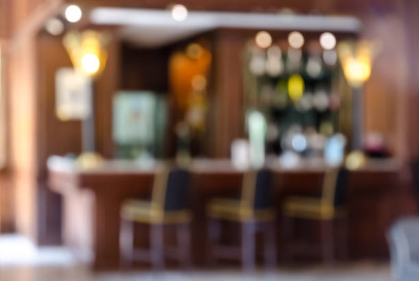 istock Blur bar counter or cafe restaurant with abstract bokeh light background 1198558715